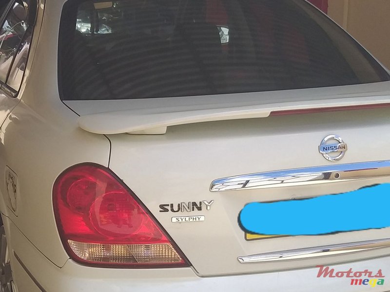 2004' Nissan Sunny photo #1