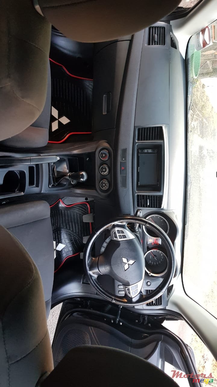 2014' Mitsubishi Lancer X photo #3