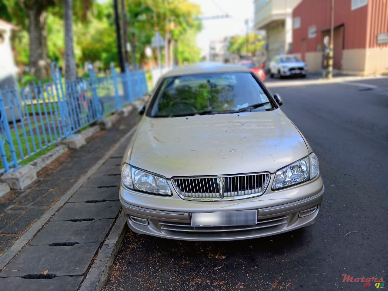2002' Nissan Sunny photo #1