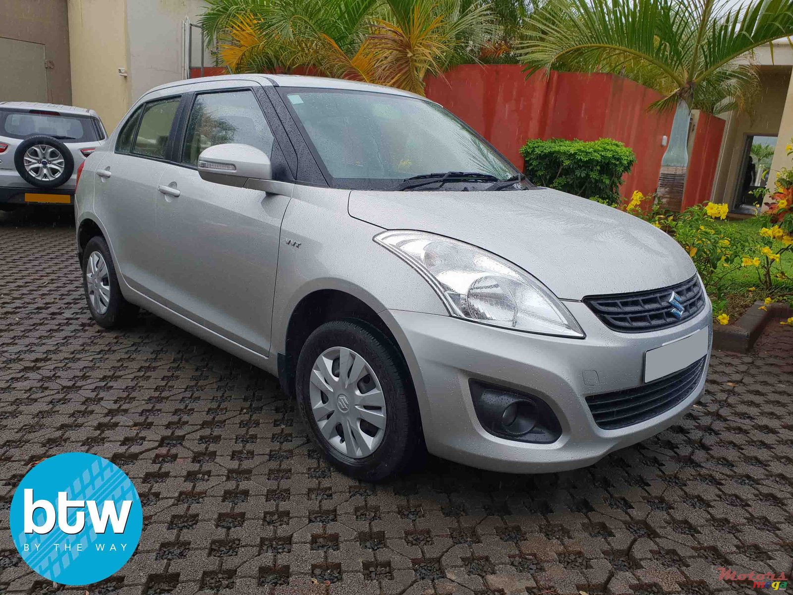 2014' Suzuki Swift Dzire photo #1