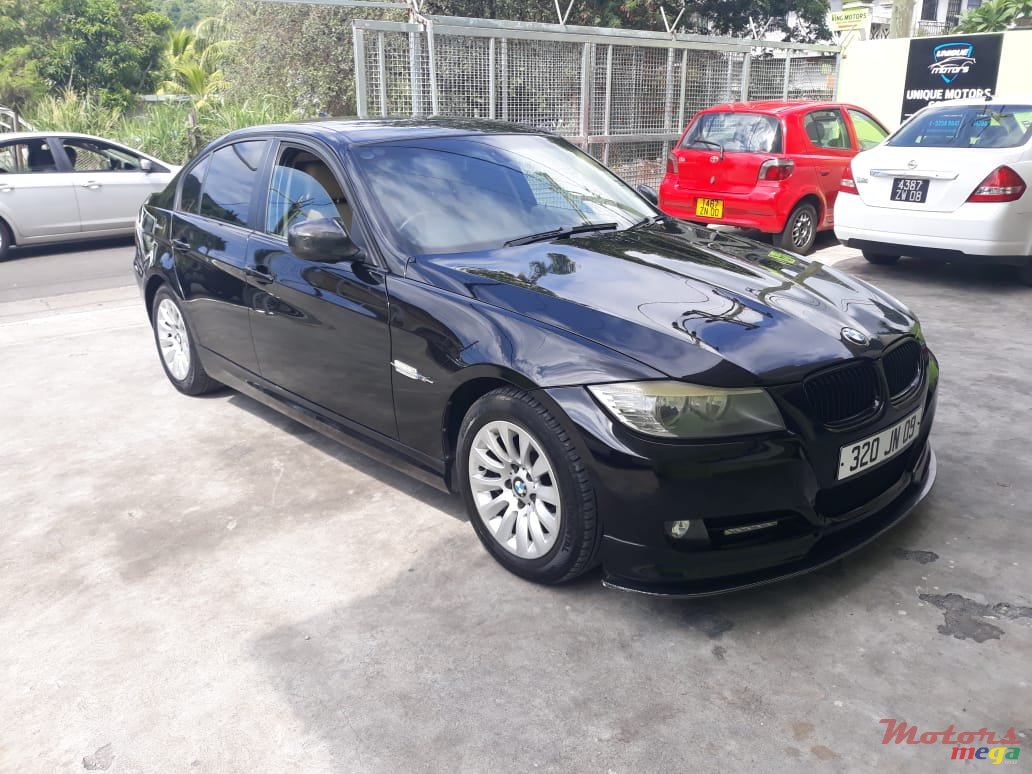 2009' BMW 320 photo #1