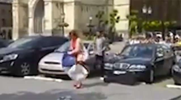 Woman Smashes Ex-Boyfriend's Car With His Guitar