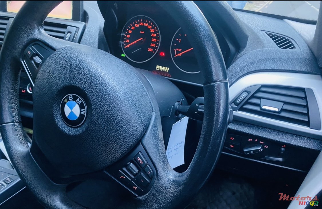 2013' BMW 1 Series M 116i photo #4