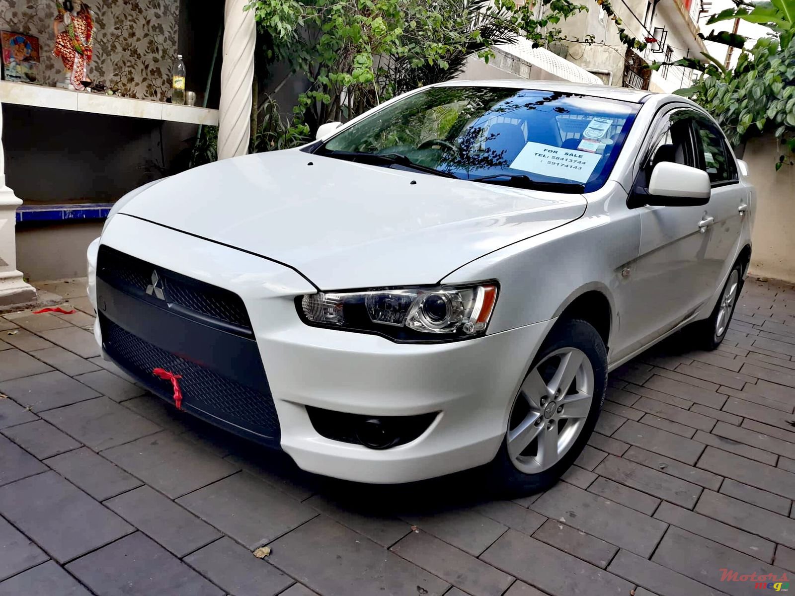 2008' Mitsubishi Lancer X Ex photo #1