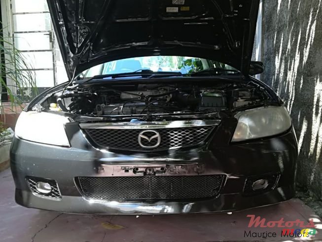 1999' Mazda 323 photo #6