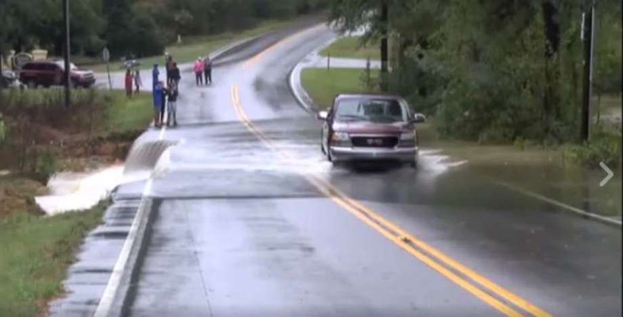 This Is Why You Should Never Drive Onto A Flooded Road