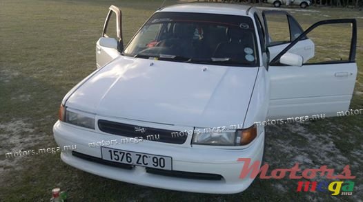 1990' Mazda 323 photo #1