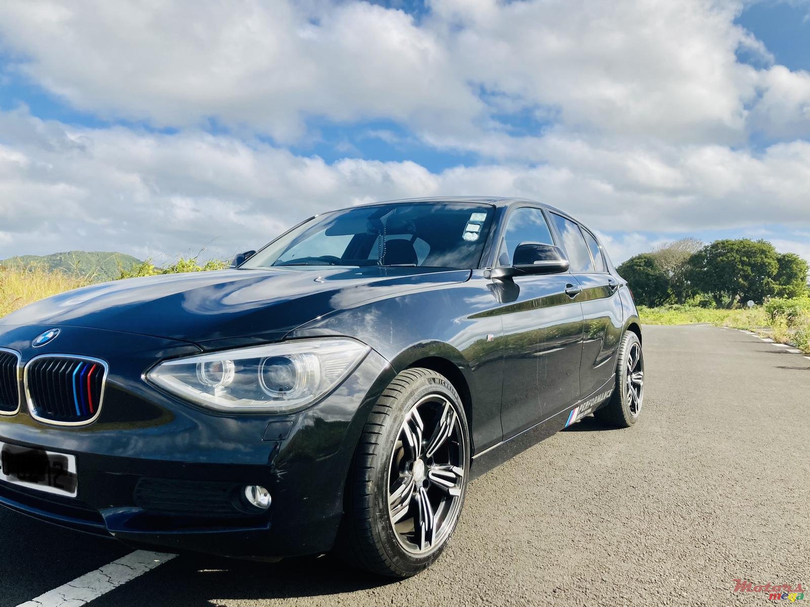 2012' BMW 116 photo #7