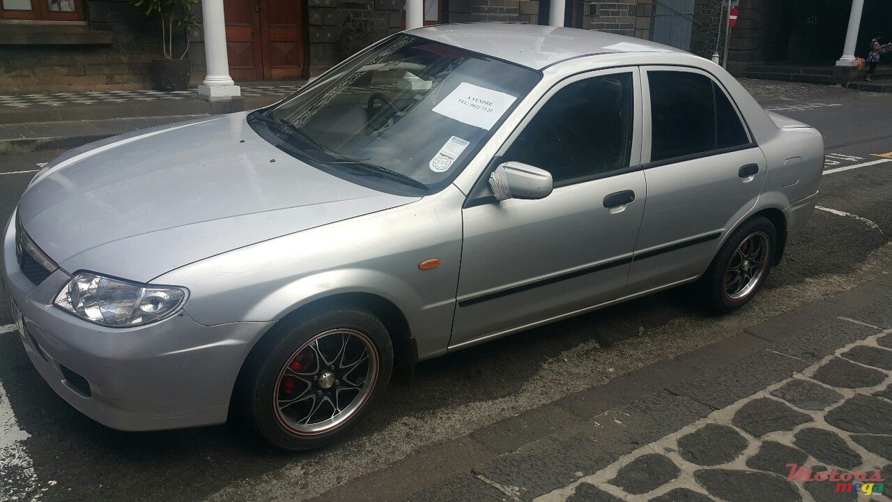 2001' Mazda 323 photo #1