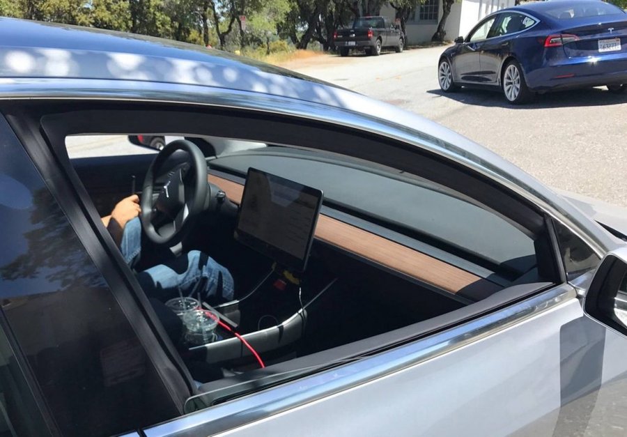 Tesla Model 3’s minimalistic interior spied ahead of July unveil