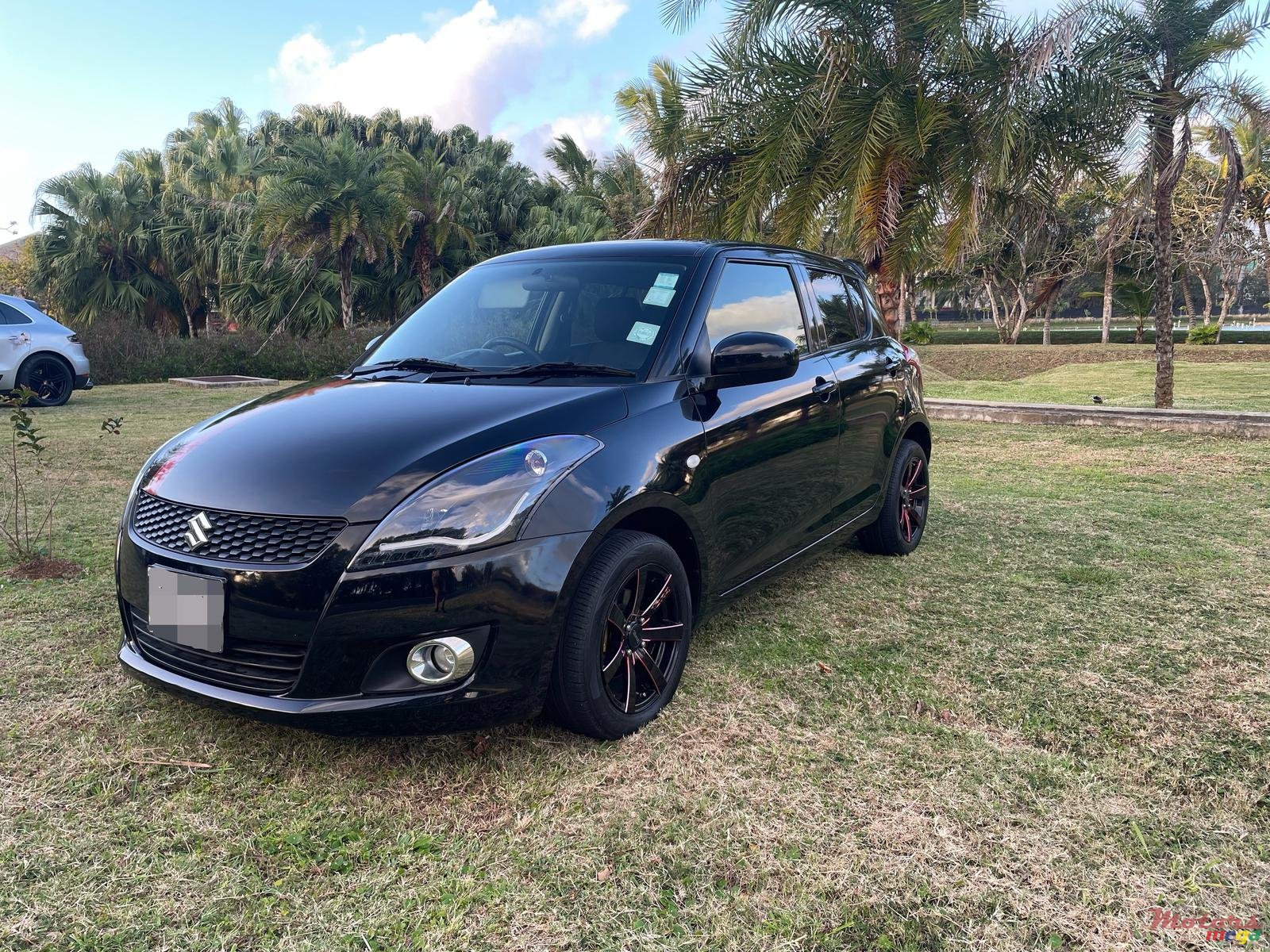 2012' Suzuki Swift photo #1