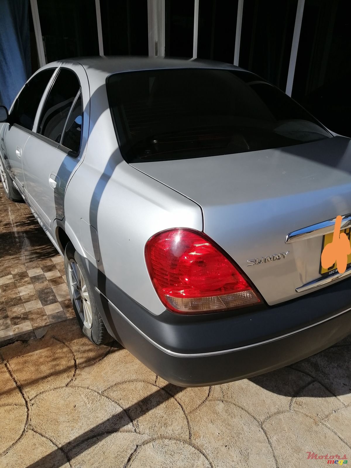 2005' Nissan Sunny photo #1