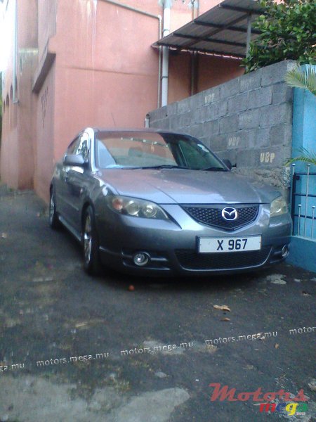 2004' Mazda 3 photo #1