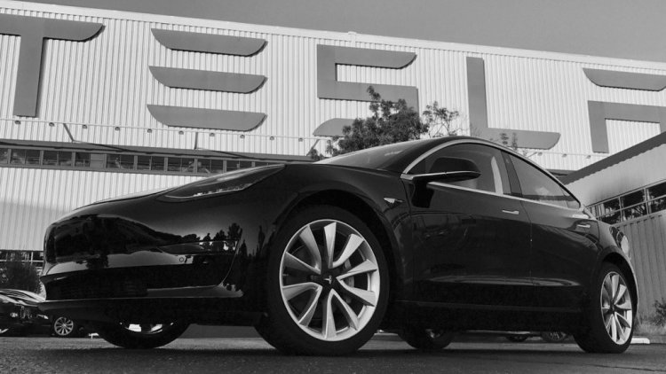 Tesla Model 3 production begins, first car rolls off the line