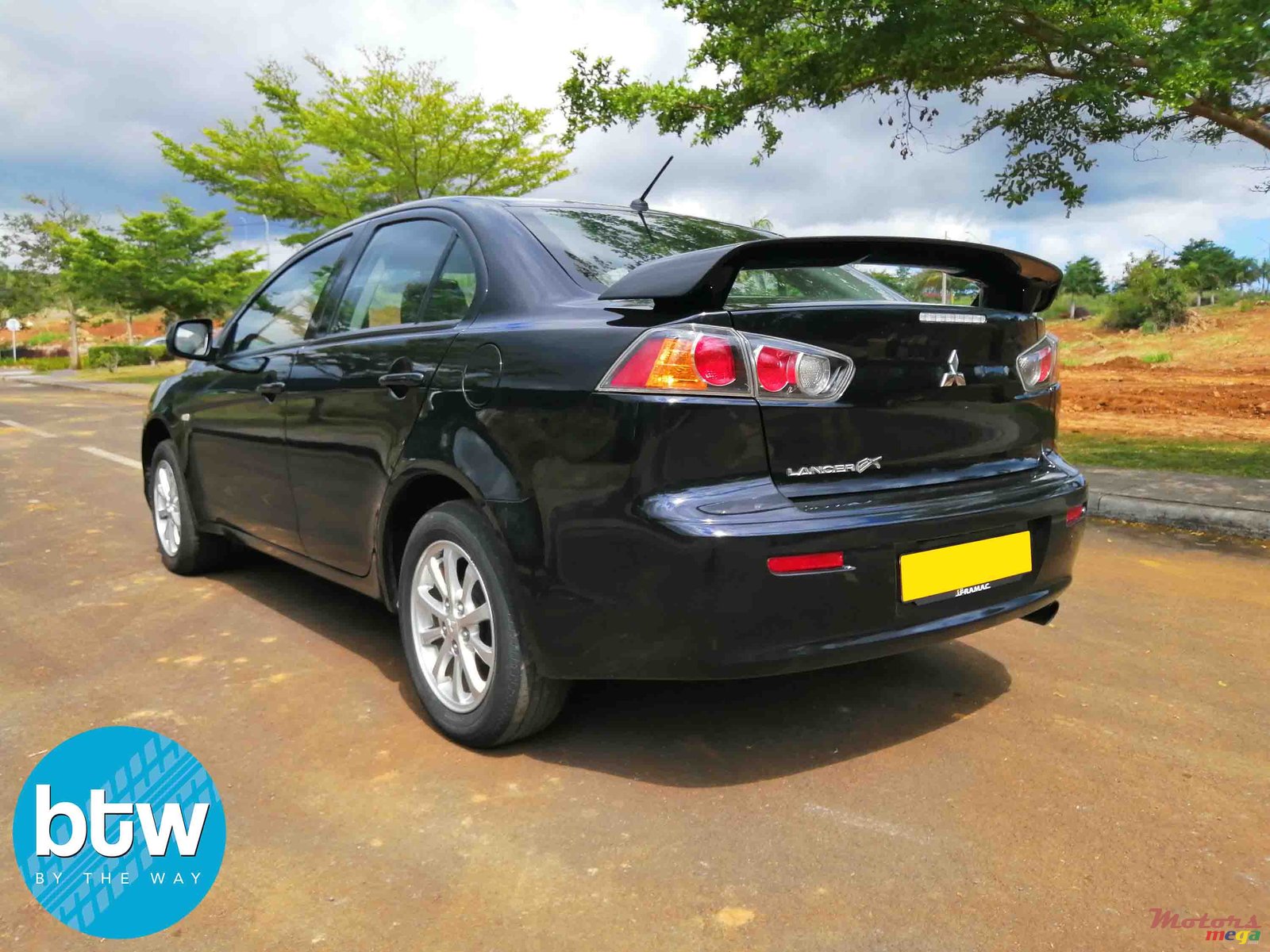 2014' Mitsubishi Lancer photo #3