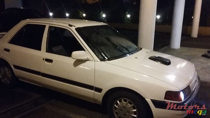 1994' Mazda 323 photo #1