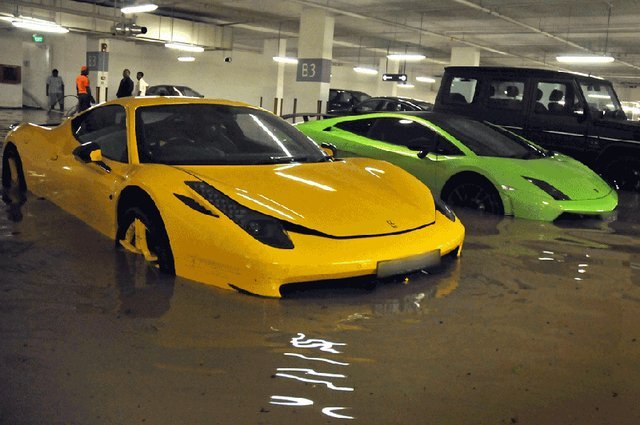 Millions in exotic cars go swimming in flooded Singapore garage