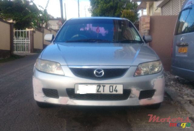 2004' Mazda 323 photo #2