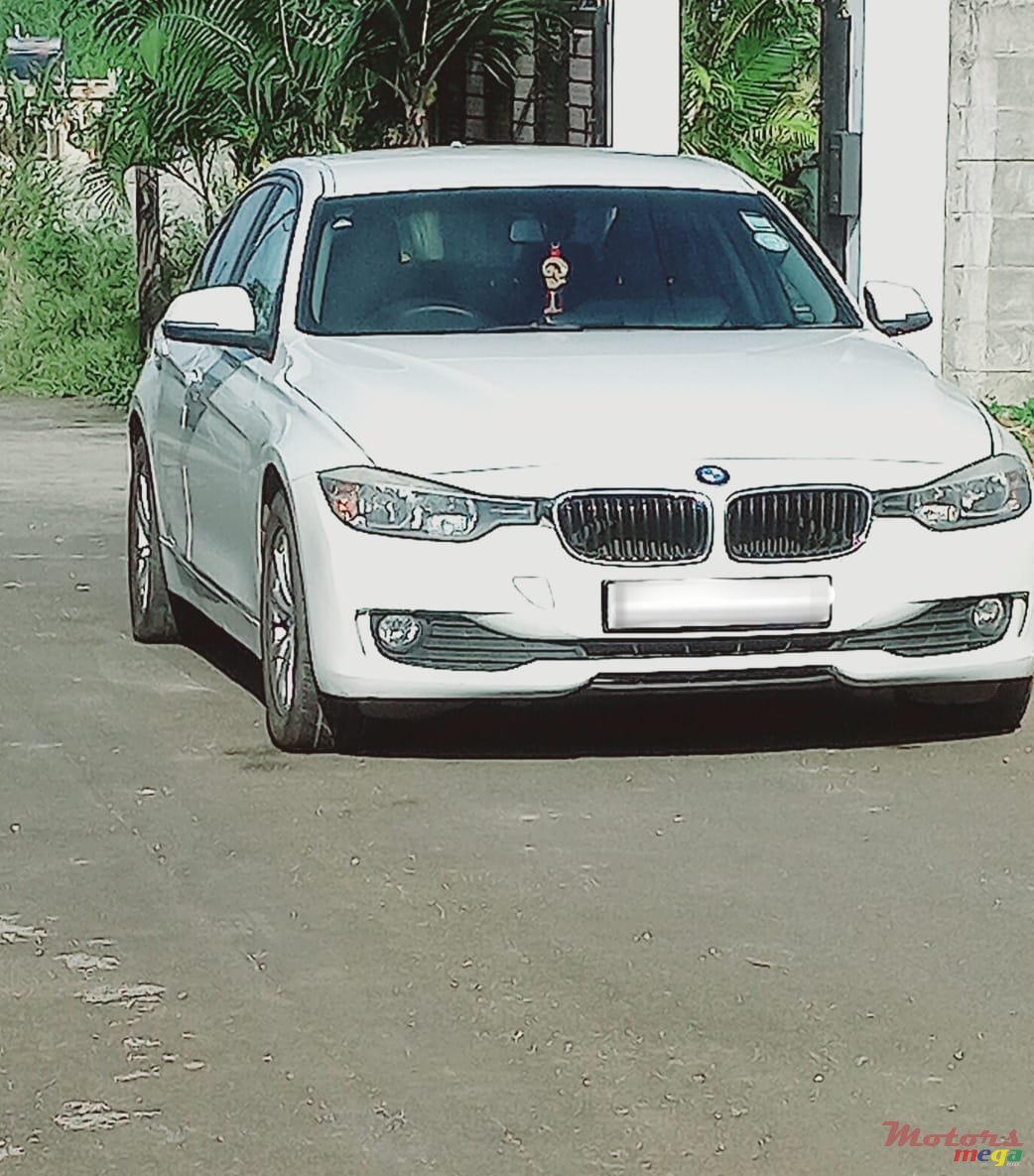 2013' BMW 116 photo #2