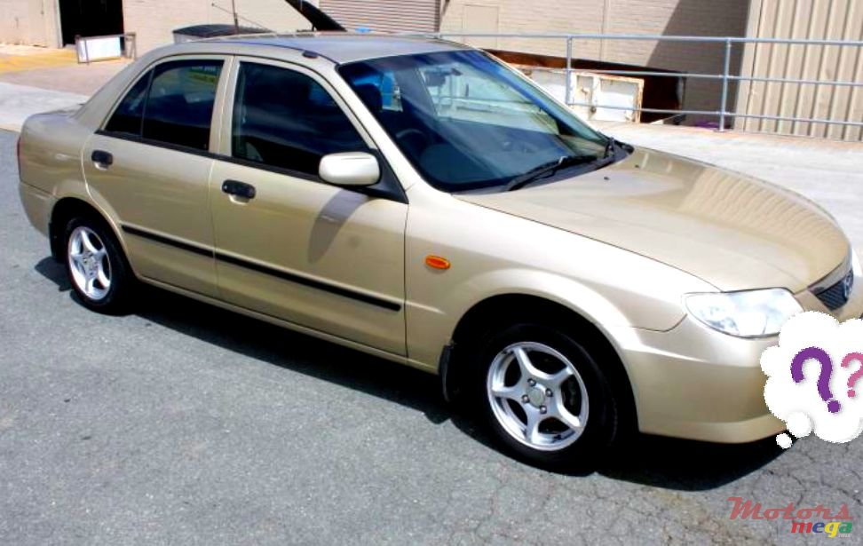 1999' Mazda 323 glxi photo #1