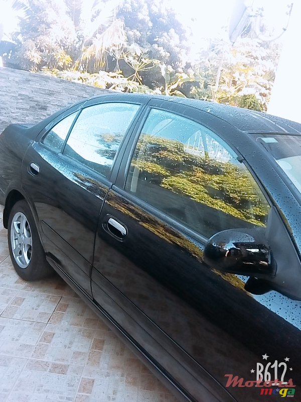 2004' Nissan Sunny photo #3