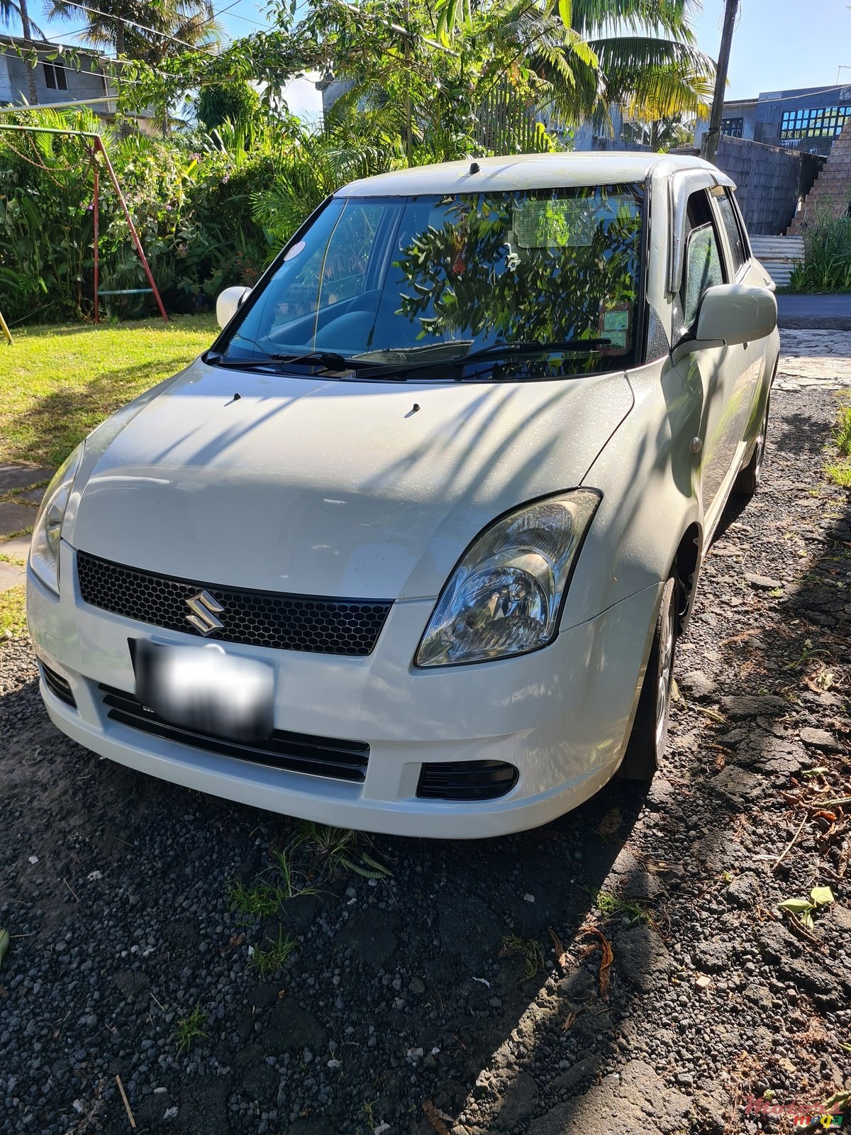 2009' Suzuki Swift photo #1