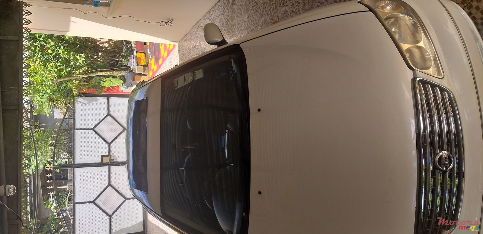 2004' Nissan Sunny photo #3