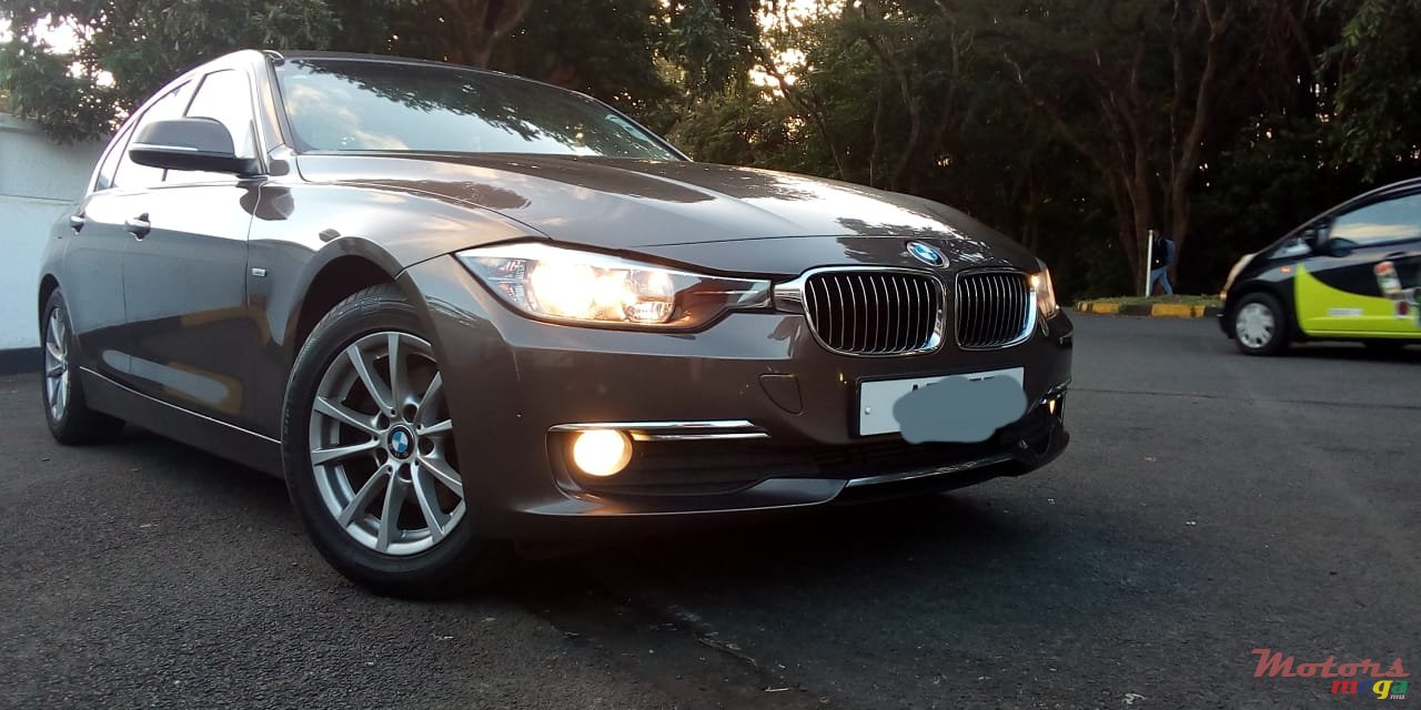 2014' BMW 3 Series photo #1