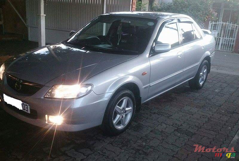 2003' Mazda 323 photo #1