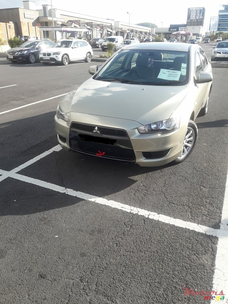 2010' Mitsubishi Ex photo #1