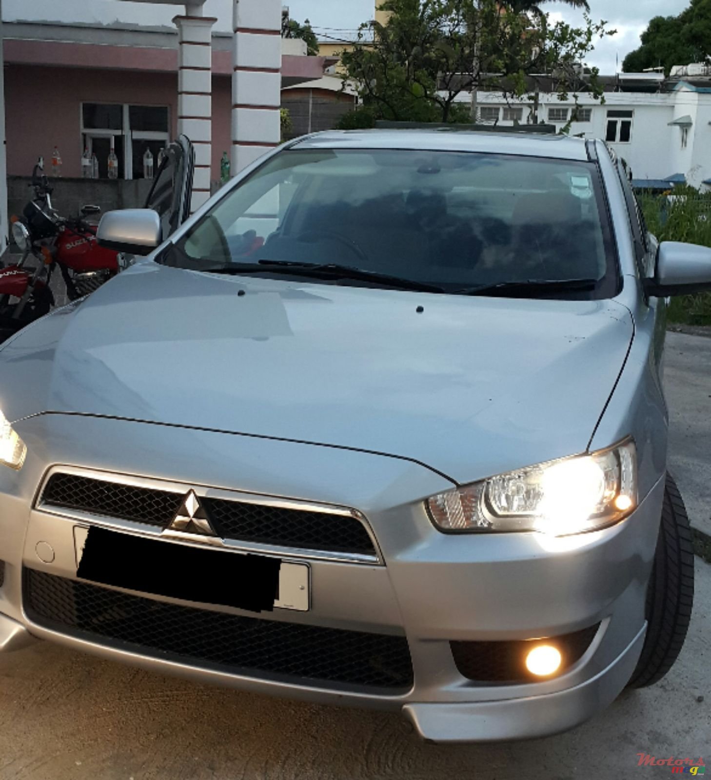 2011' Mitsubishi Lancer X Original photo #2