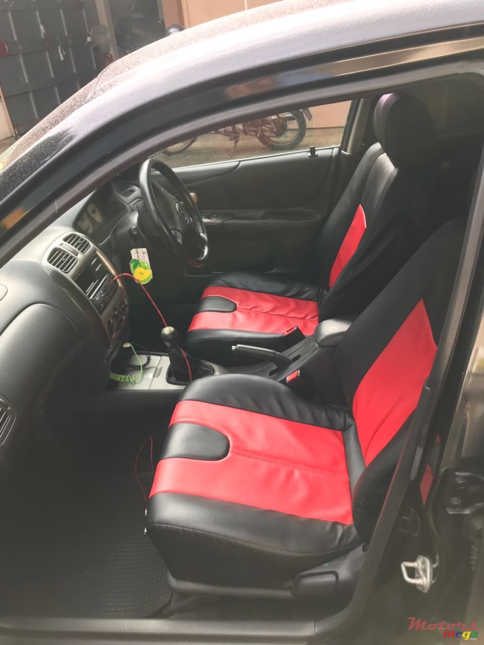 2003' Mazda Protege Origine sport 323 photo #5