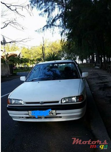 1994' Mazda 323 photo #1