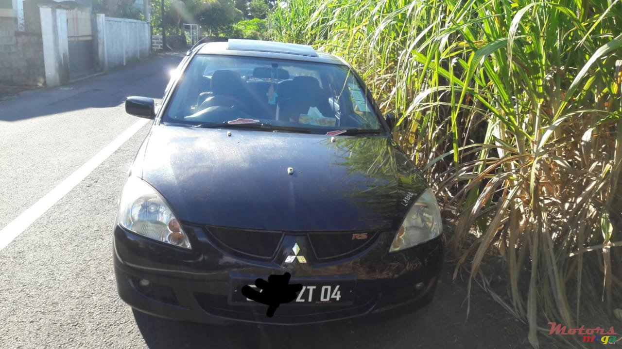 2004' Mitsubishi Lancer photo #2