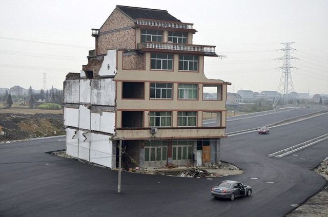 House in the Middle of a Motorway