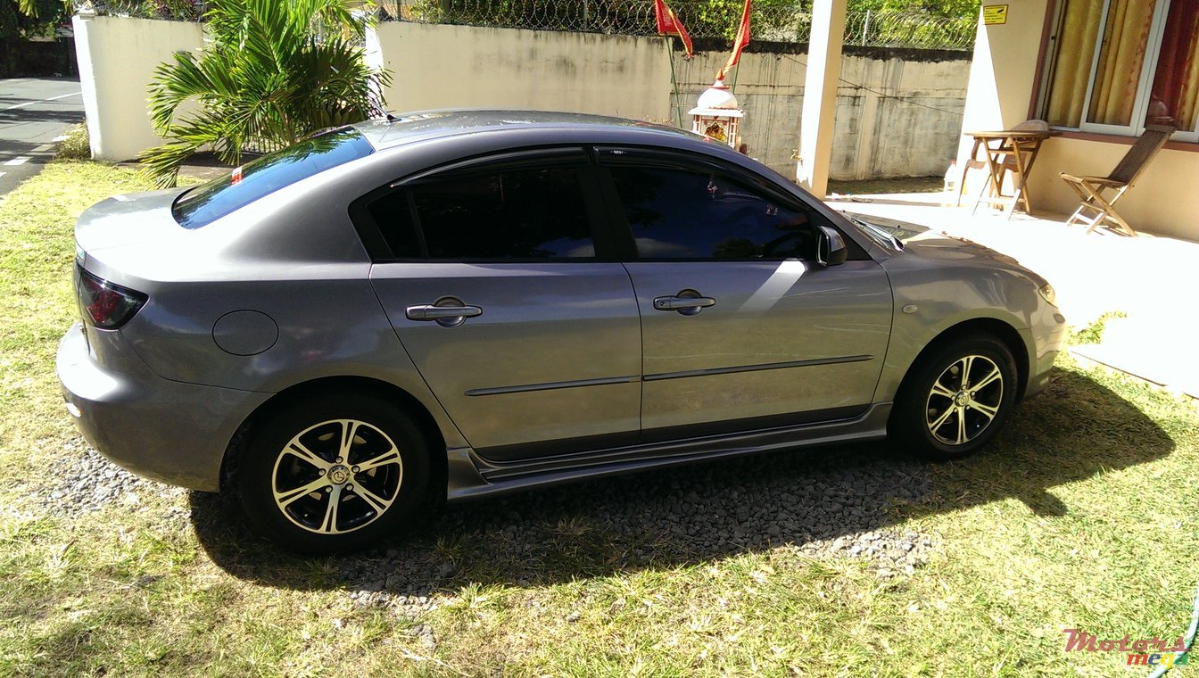 2004' Mazda 3 photo #1