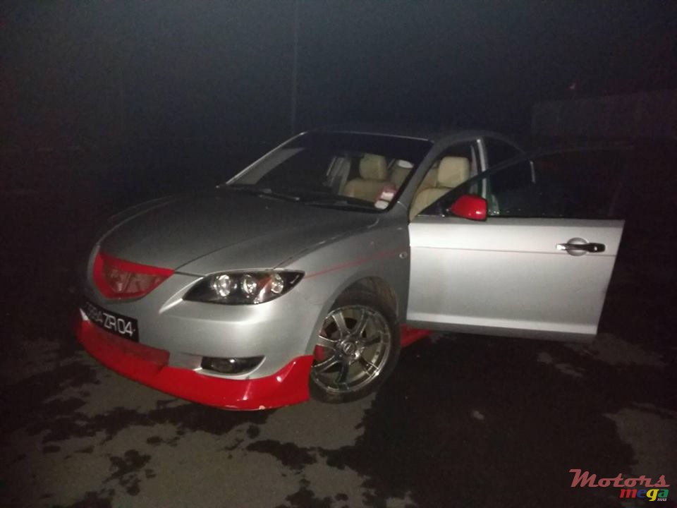 2004' Mazda 3 photo #2