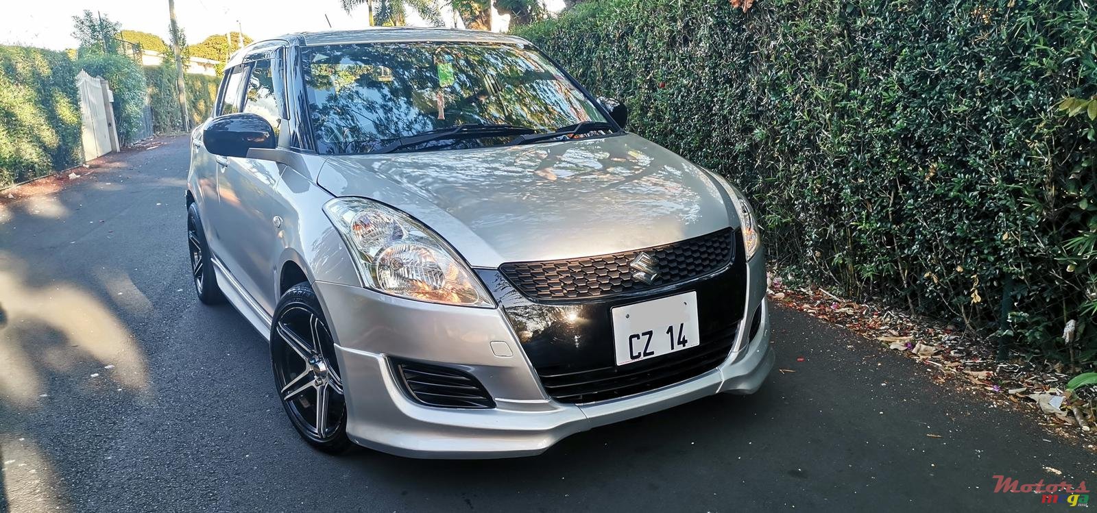 2014' Suzuki Swift photo #1