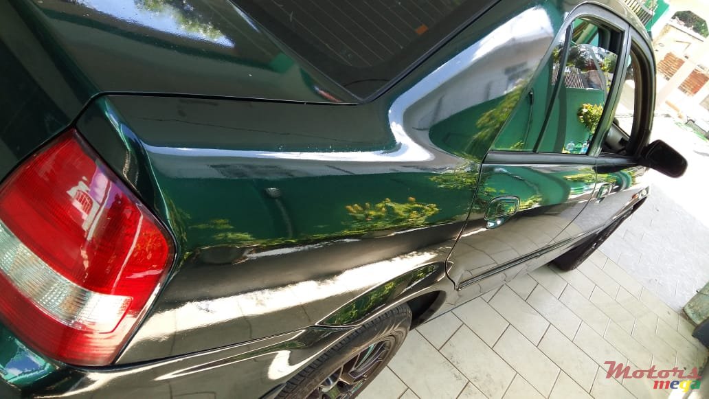 2002' Mazda 323 photo #7