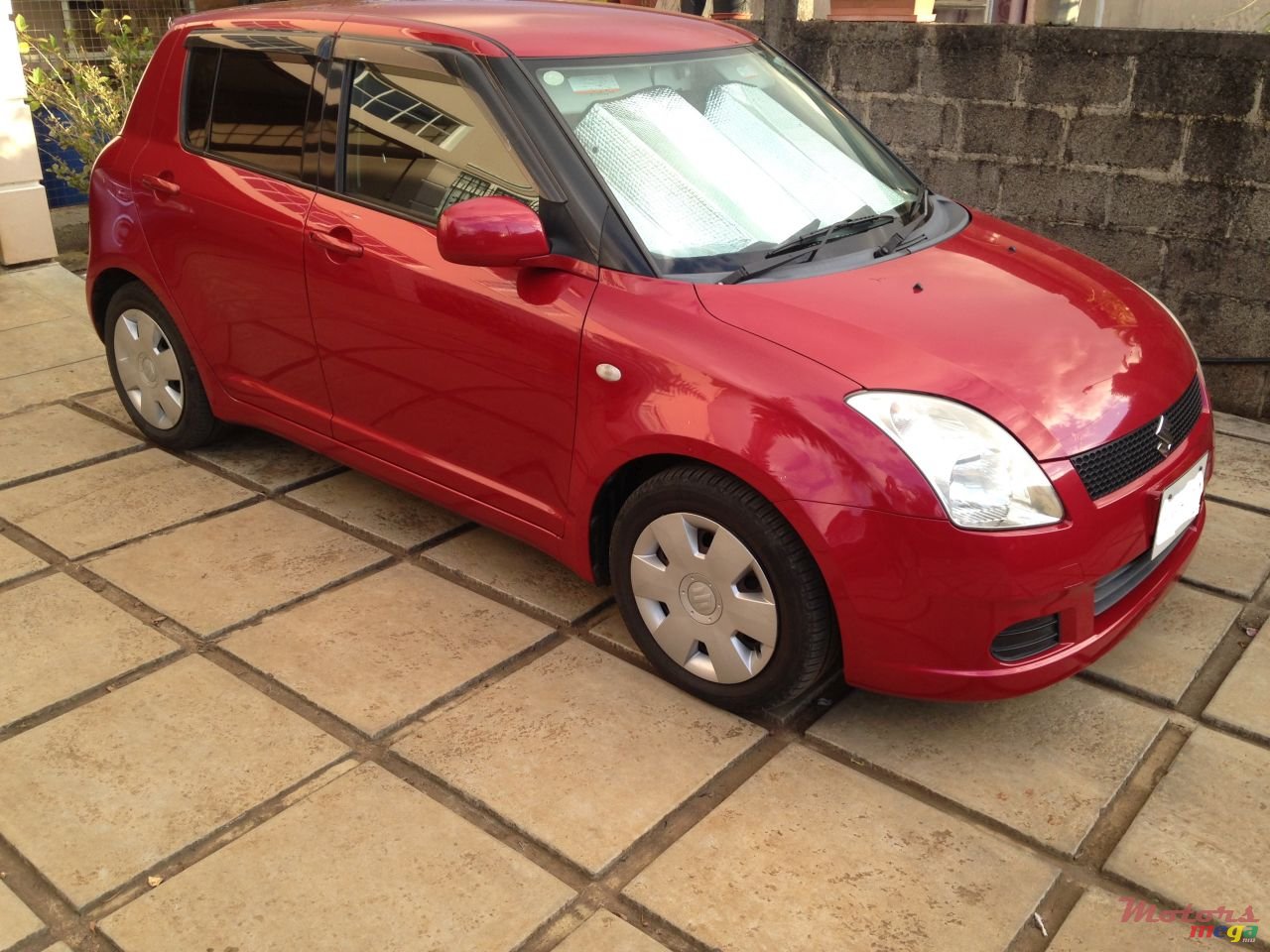 2006' Suzuki Swift photo #1