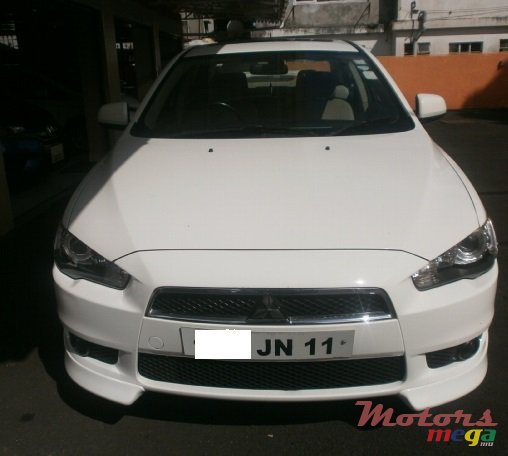 2011' Mitsubishi Lancer Ex photo #1