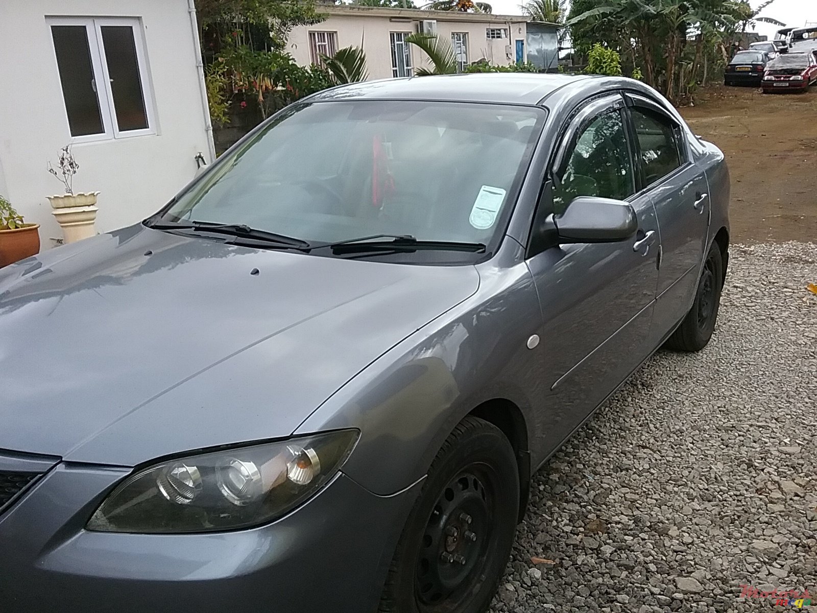 2005' Mazda 3 photo #1