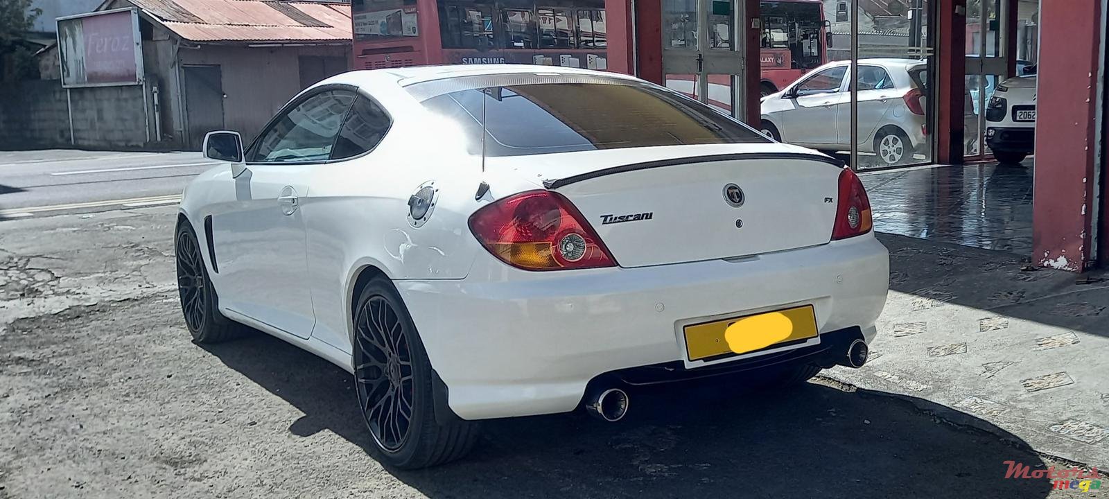 2004' Hyundai Tuscani photo #5