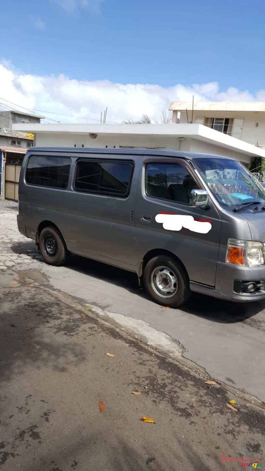 2009' Nissan Urvan photo #1