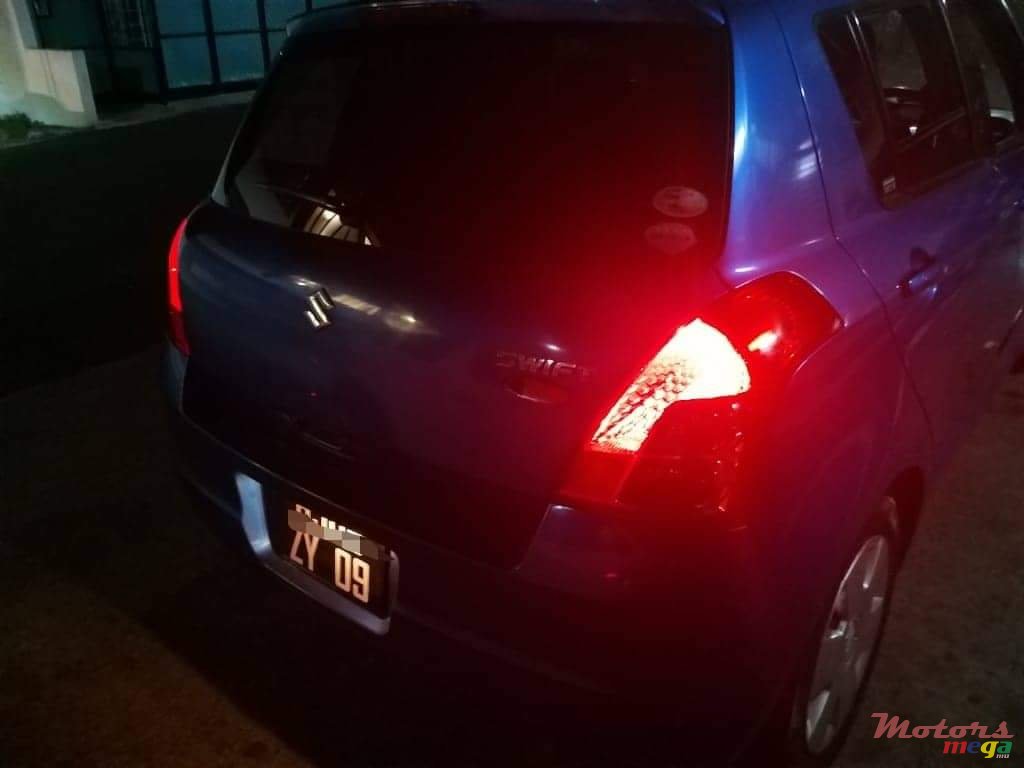 2009' Suzuki Swift photo #1