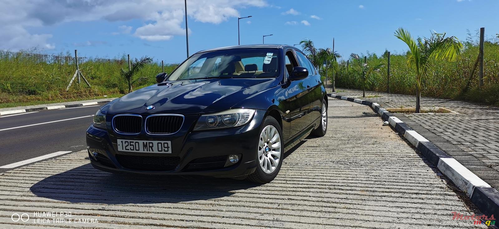 2009' BMW 320 photo #1