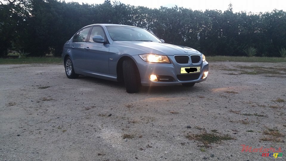 2009' BMW 316 photo #1