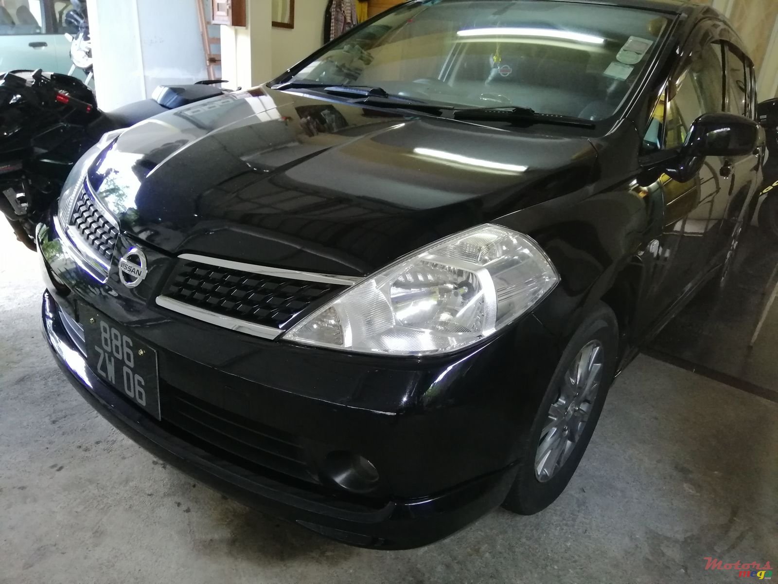 2006' Nissan Tiida photo #1