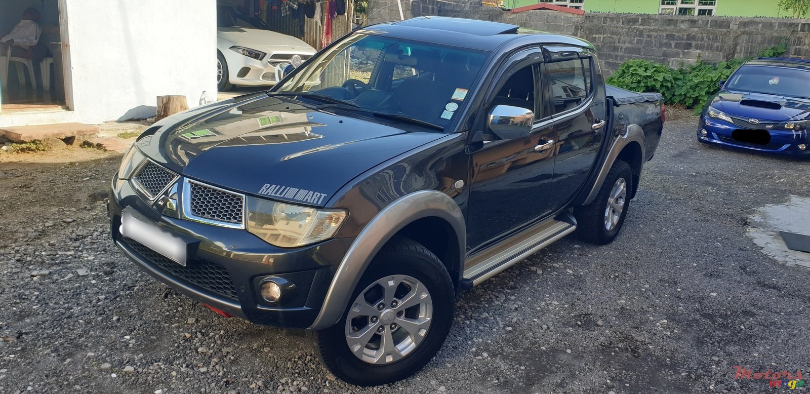 2011' Mitsubishi L200 Sportero photo #2