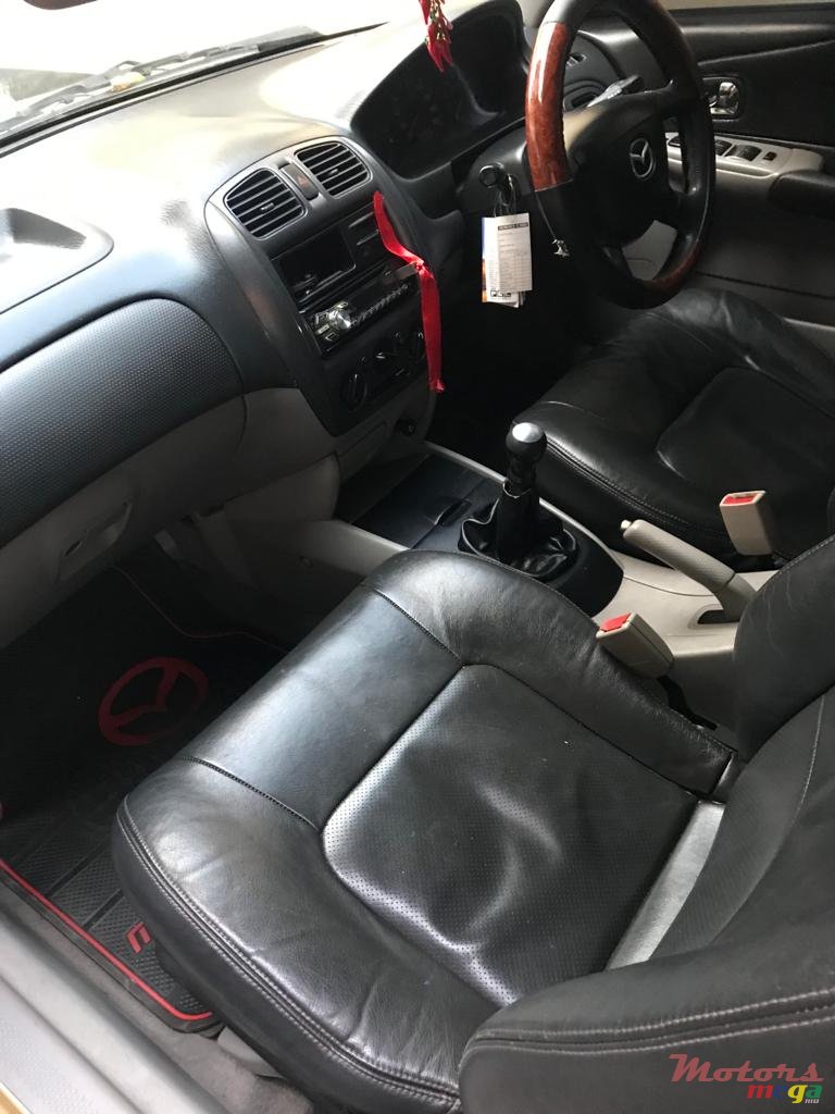 2001' Mazda 323 photo #3